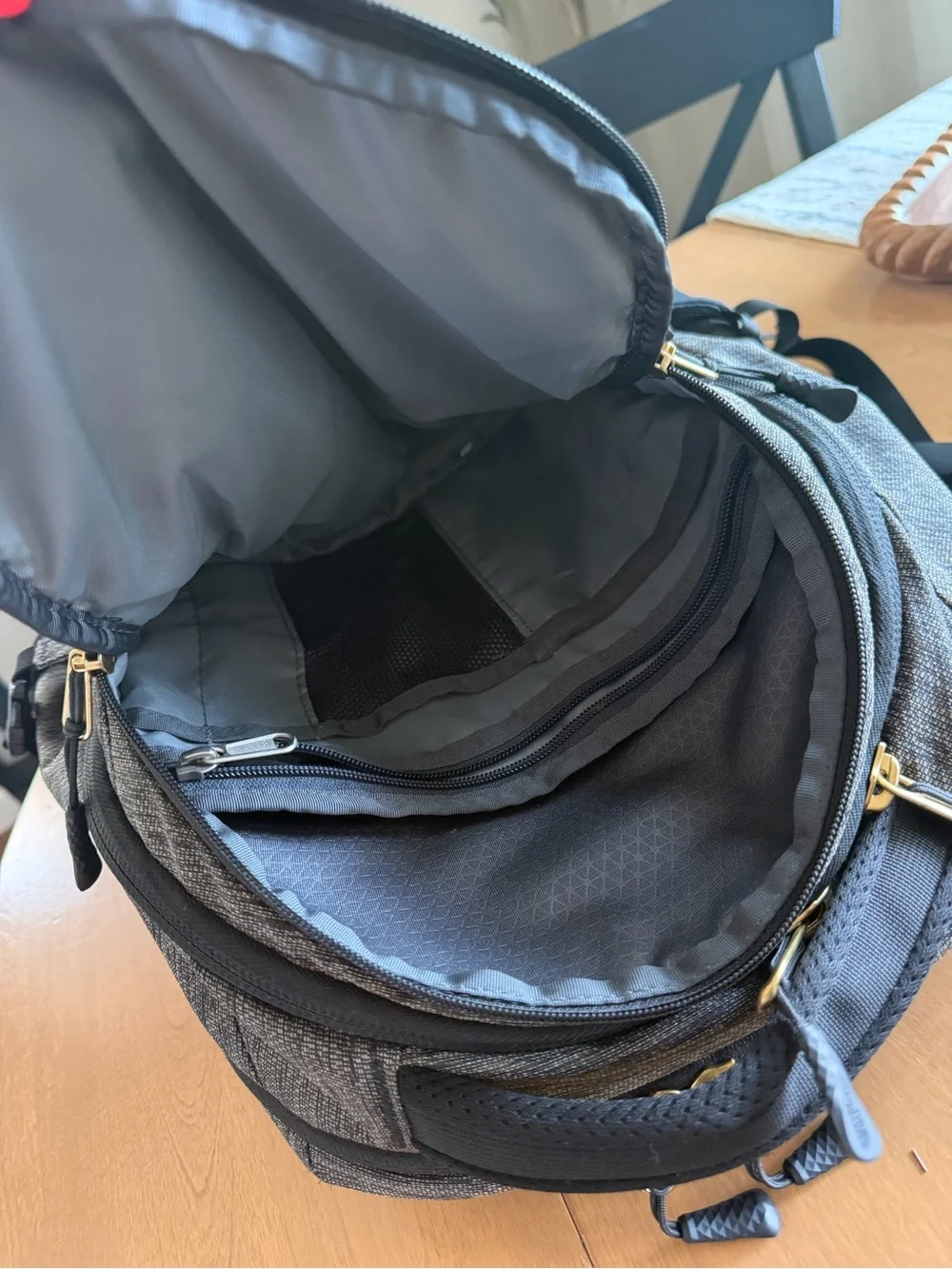 The North Face Borealis Backpack in Charcoal and Black with Gold Logo
